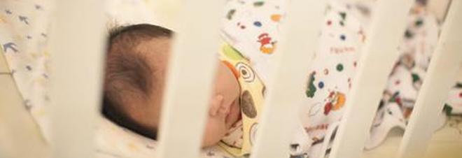 epa03853561 A photo made available 06 September 2013 shows a newborn baby at a crisis pregnancy care center in Hong Kong, China, 04 September 2013. The center is run by 'Mother's Choice', a non-profit organization caring for pregnant teenagers and for orphaned babies, many of whom suffer from physical or learning difficulties such as Down's syndrome. Founded in 1987, the organization has provided counselling and care to over 51,000 pregnant teenagers and cared for over 3,600 babies.  EPA/ALEX HOFFORD