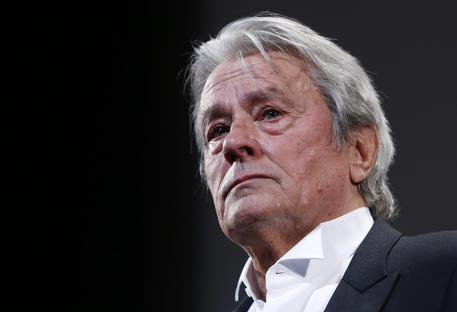 epa03717224 French actor Alain Delon reacts as he attends the screening of 'Plein Soleil' during the 66th annual Cannes Film Festival in Cannes, France, 25 May 2013. The movie is presented out of competition, as part the Cannes Classic selection, at the festival which runs from 15 to 26 May.  EPA/GUILLAUME HORCAJUELO