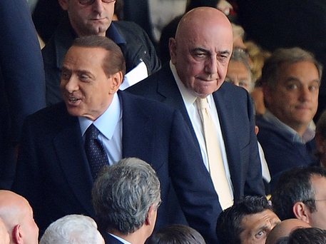 Italian prime minister Silvio Berlusconi (L) and Ac Milan Ceo Adriano Galliani attend a Serie A soccer match between Ac Milan and Bologna at the Giuseppe Meazza stadium in Milan, northen Italy, 1 May 2011. 
ANSA/DANIEL DAL ZENNARO