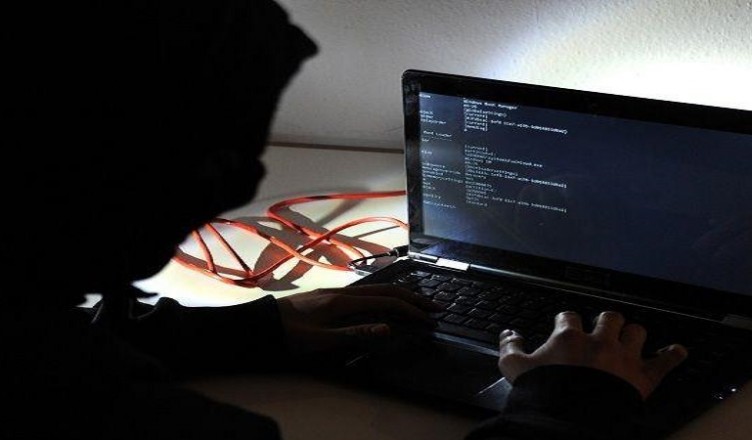 Hacker in front of the screen